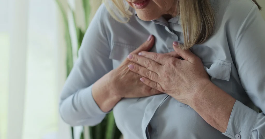 Close up old woman, chest inflammation and cardiovascular emergency