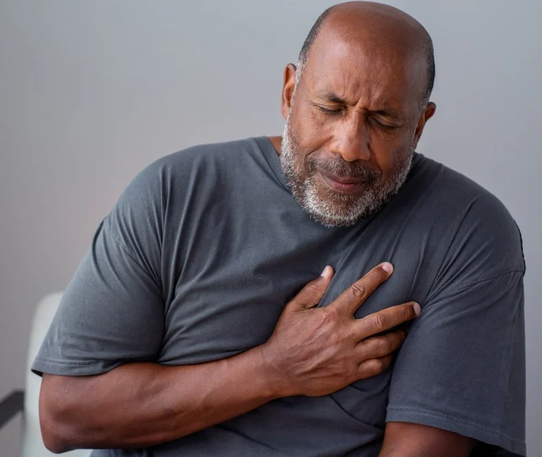 Older man having chest pains