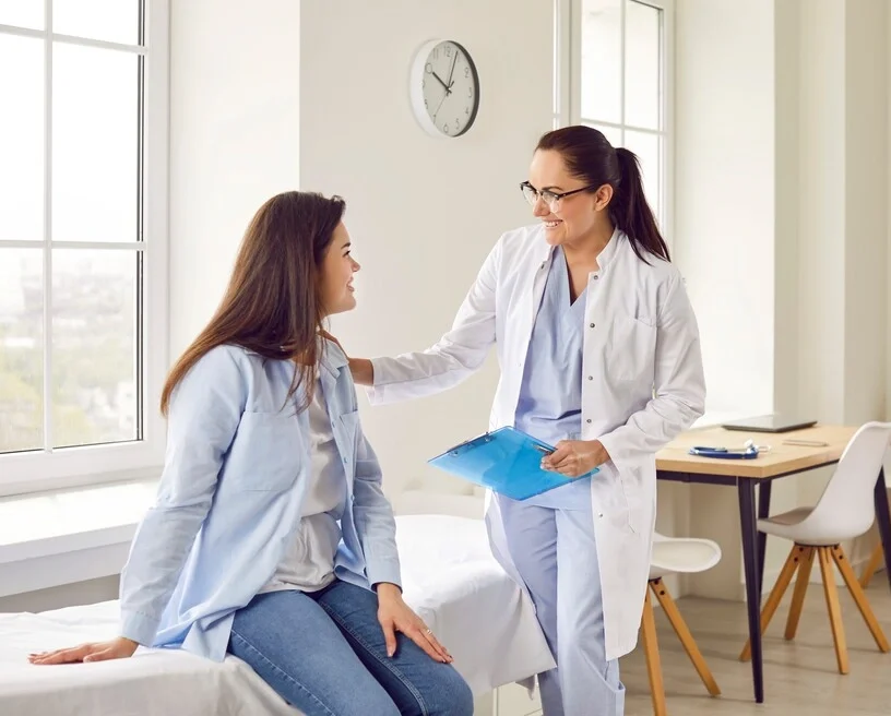 doctor consulting female patient